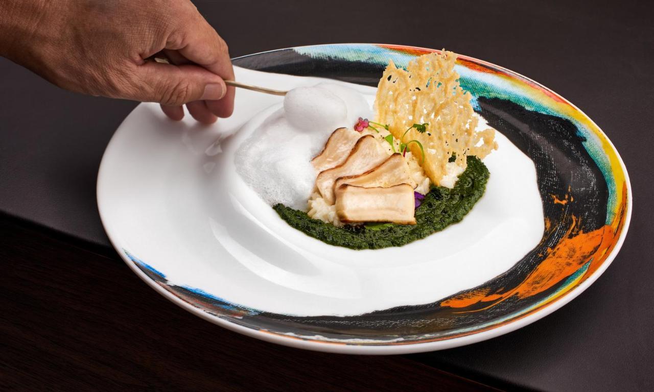 Ette Luxury Hotel & Spa Four Corners Exterior photo A plate of food